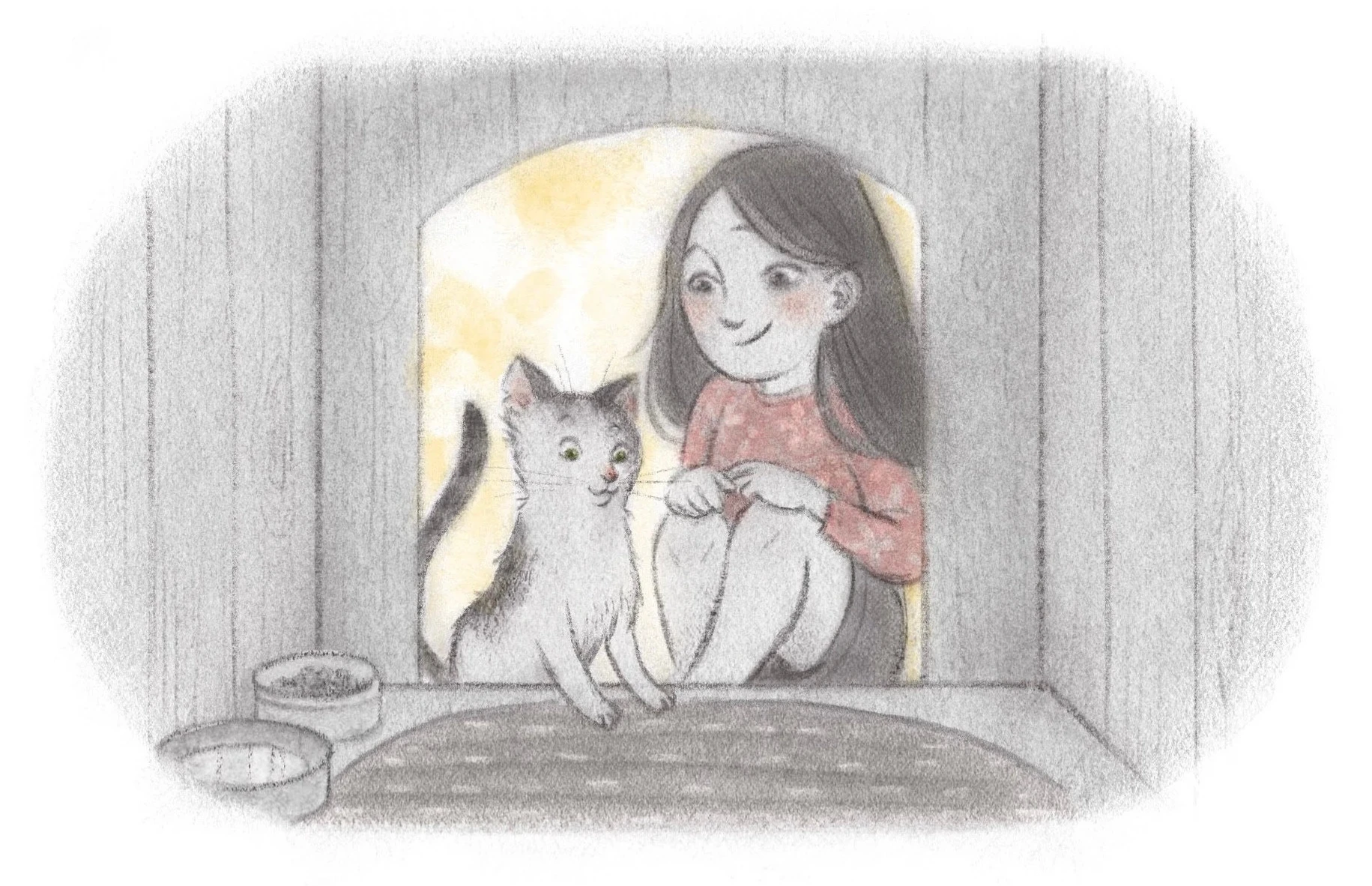 Girl sitting with her cat in a lamplit shed