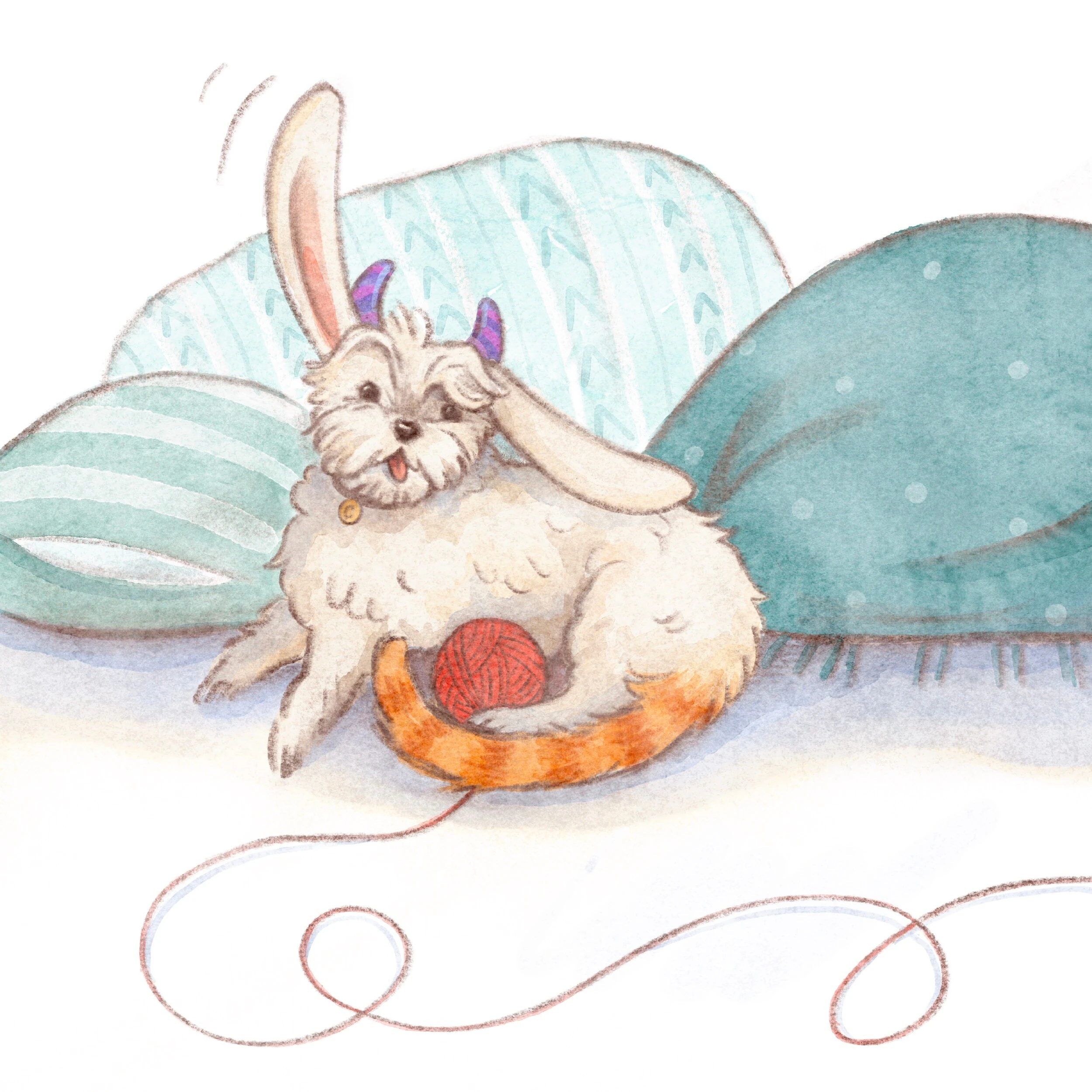 Dog with bunny ears lying on pillows playing with a red yarn ball