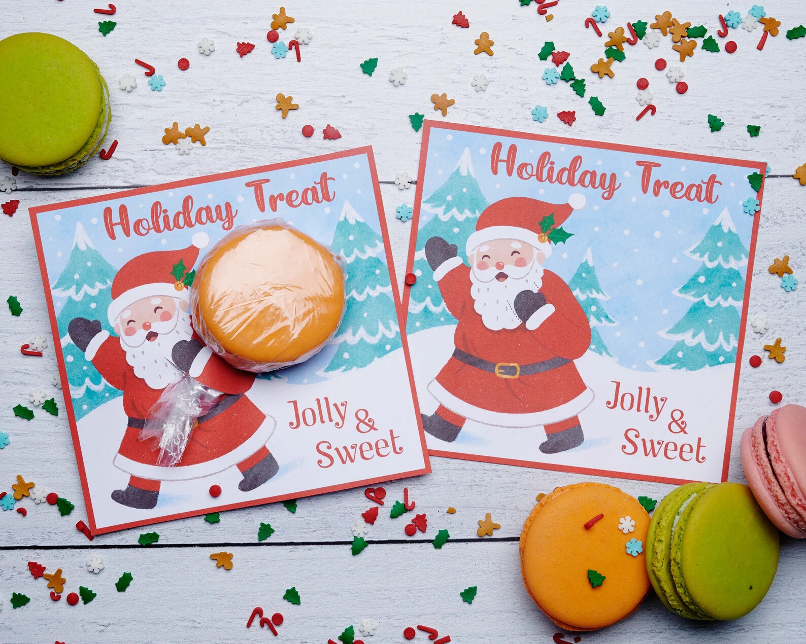 Photo of Holiday Treat Santa cards paired with macarons